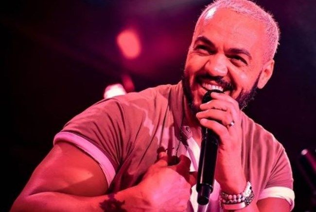 Cantor Belo é preso após show em comunidade