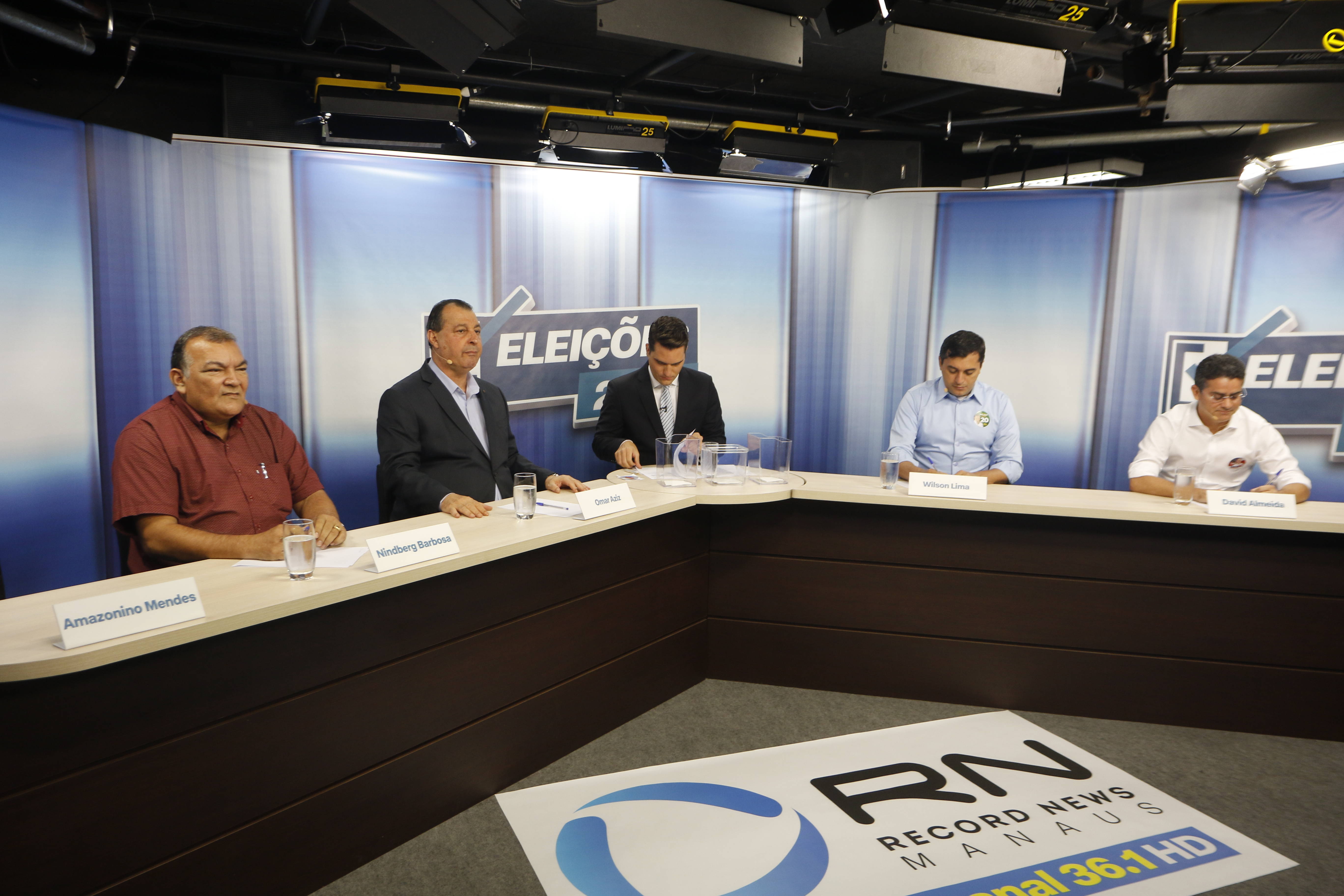 Amazonino foge e candidatos mantêm debate morno na Record News