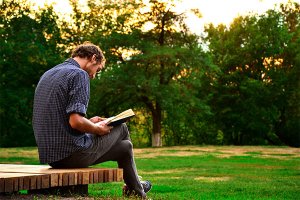 man reading outside