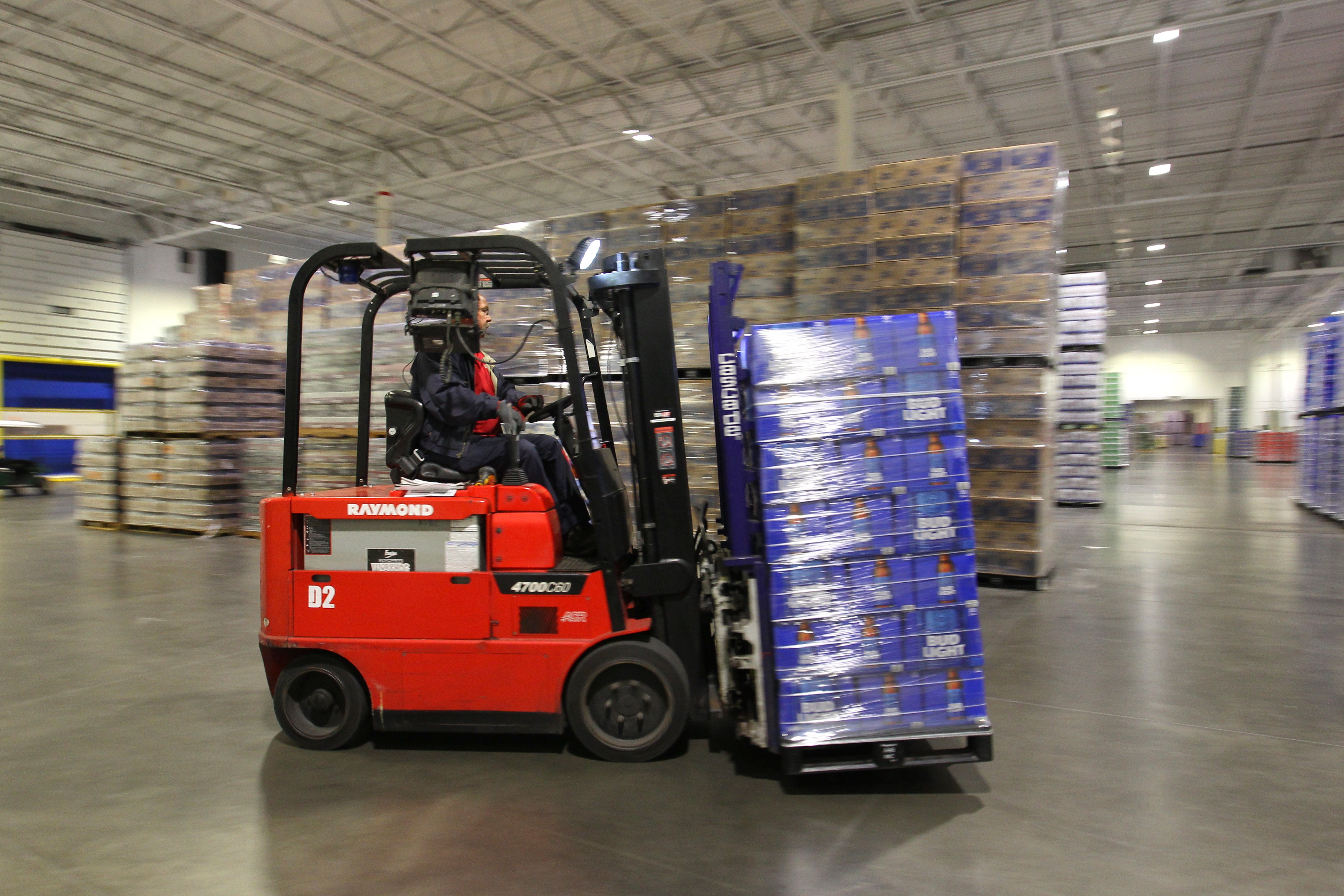 forklift in warehouse lighting