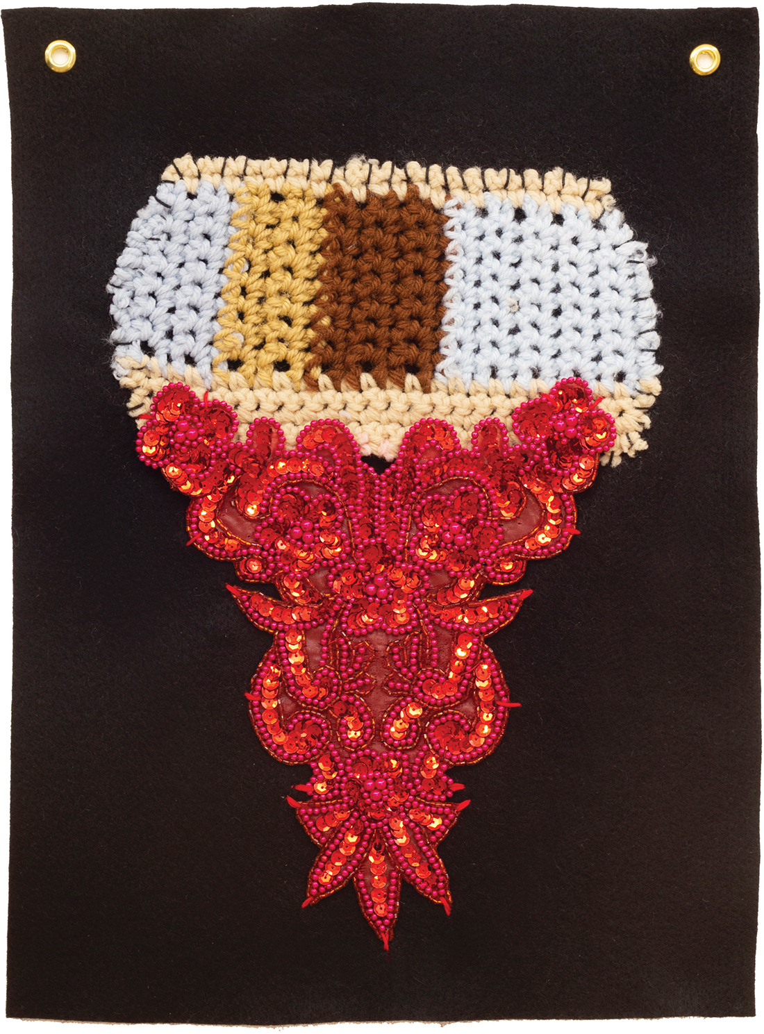A collage of a crocheted swatch and red sequin appliqué on a black background.