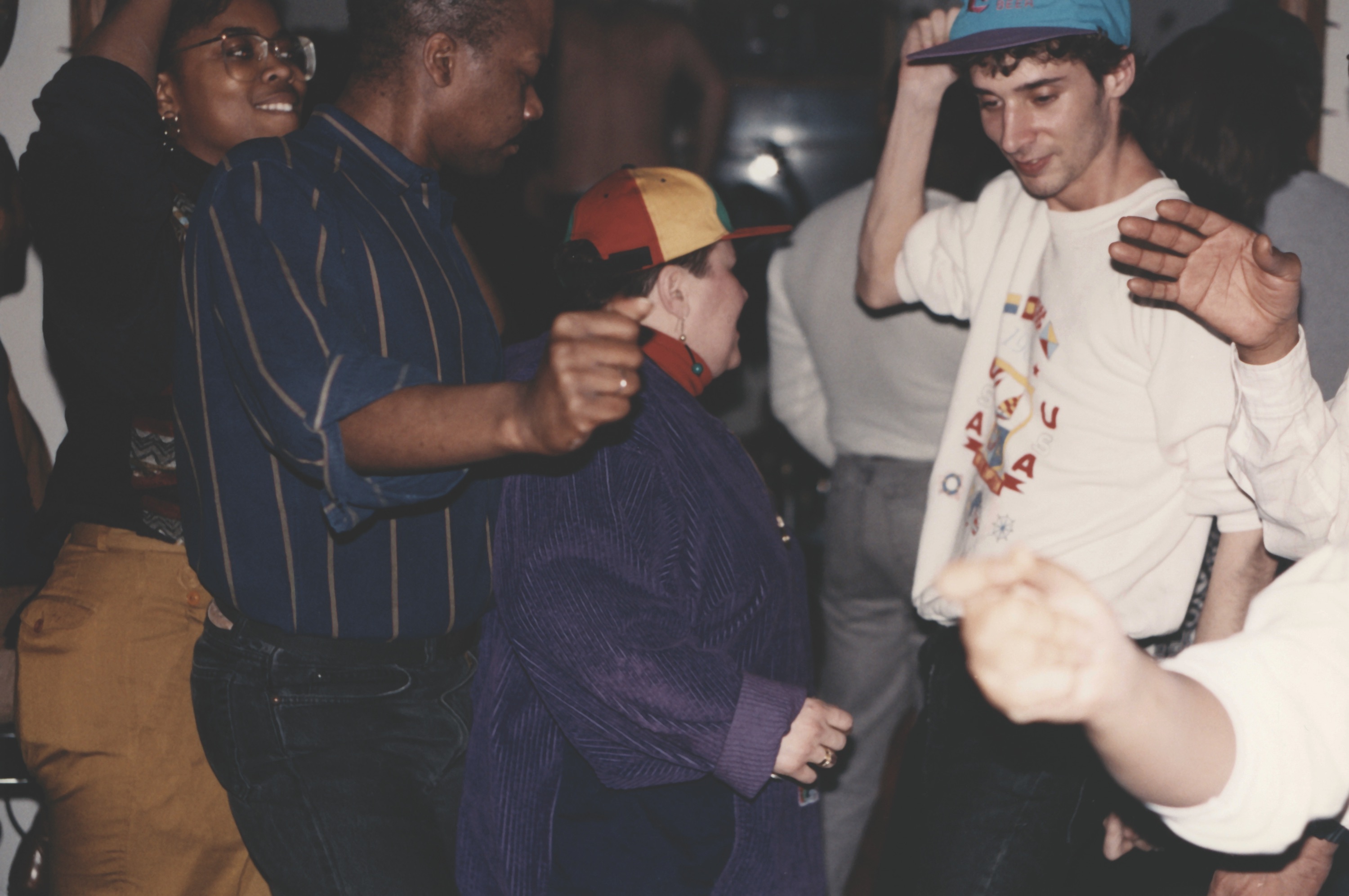 people dancing in a club together, 1990's Chicago