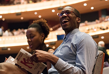 A couple enjoying an performance at the Schuster Center