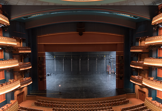 Mead Theatre stage with curtain opened as seen from the center balcony
