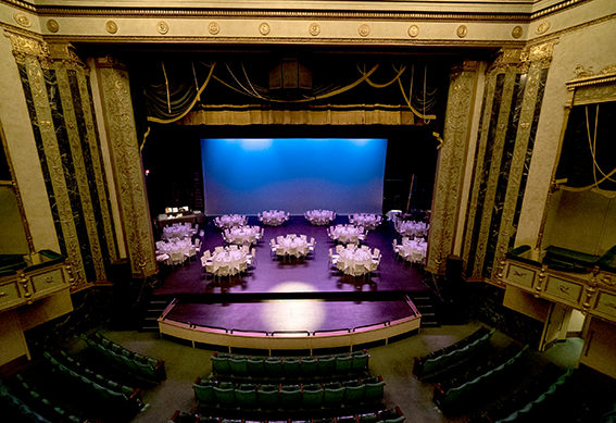 Looking from the balcony of the Victoria Theater to the stage set up for a reception.