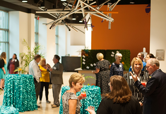 Attendees enjoying an event in the PNC Art Annex Lobby