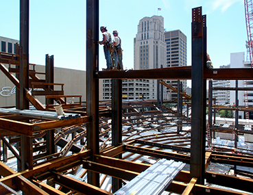 Steel workers working on the Schuster Center.