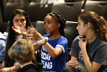 Students participating in a class.