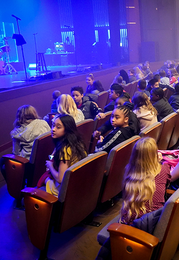 Students waiting for a performance at the Schuster Center to begin.