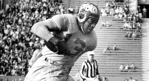 Los Angeles Rams Running back Kenny Washington (13) breaks a tackle during a 31-14 win over the Pittsburgh Steelers on December 12, 1948, at the Los Angeles Memorial Coliseum in Los Angeles, California. Kenny Washington - Los Angeles Rams - File Photos (AP Photo/NFL Photos)