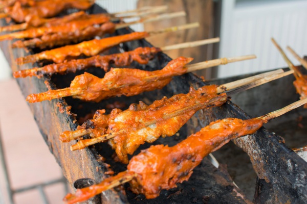 Grilled chicken on the grill roadside of Thailand