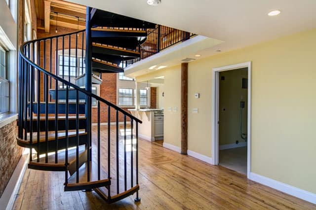 transitional condo steel spiral stair