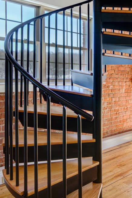 transitional condo steel spiral stair
