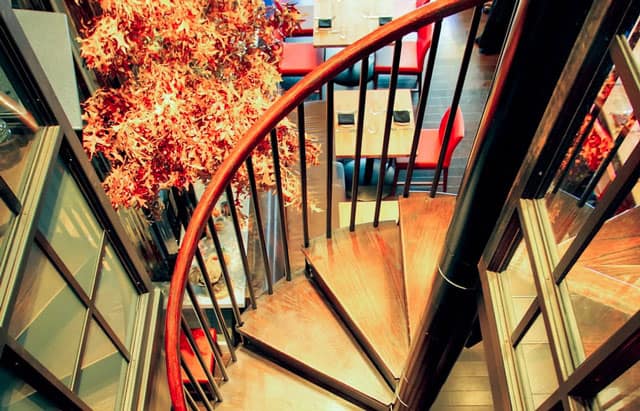 classic steel spiral stair with solid wood steps