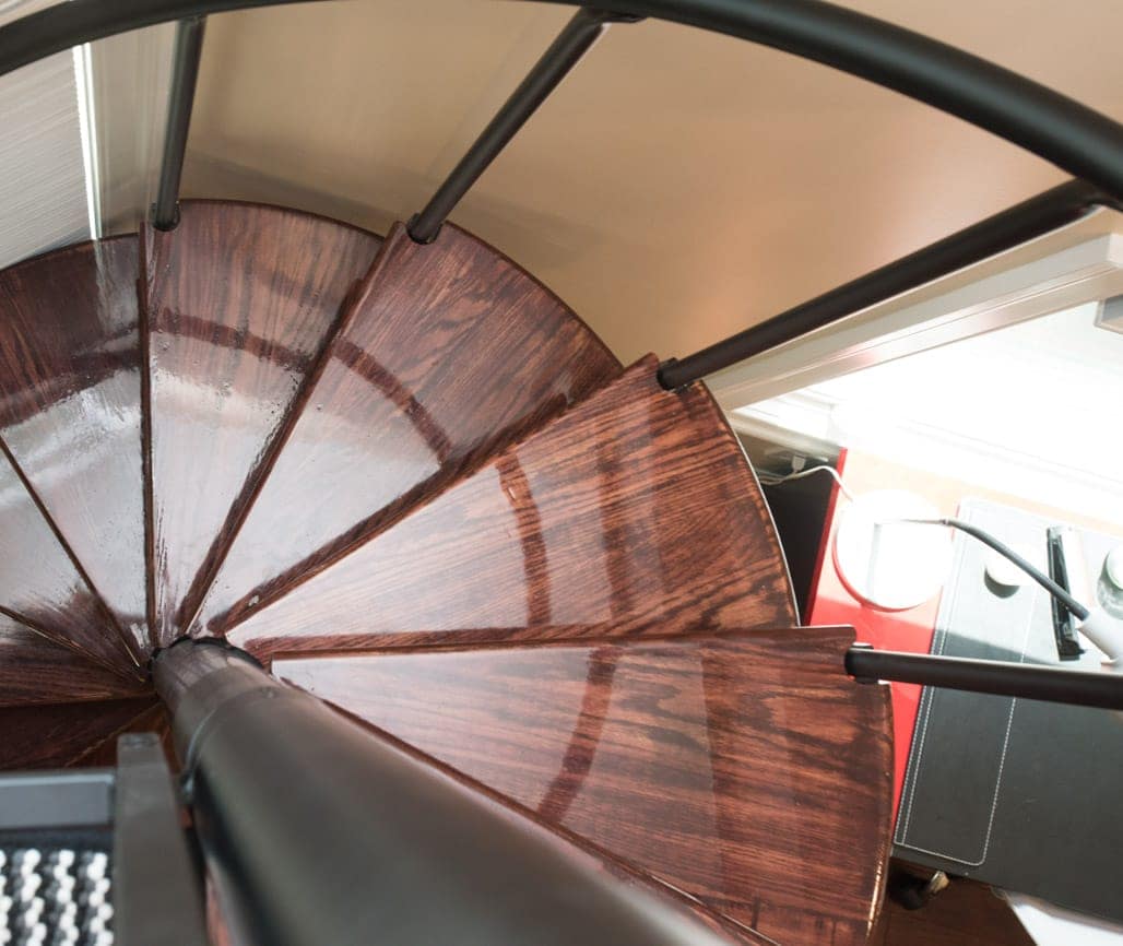 rich toned wood accents on staircase