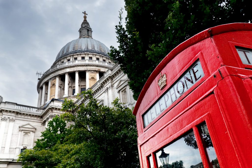 St Pauls Cathedral dome and red telephone booth. Symbols of London, the UK. Black and white