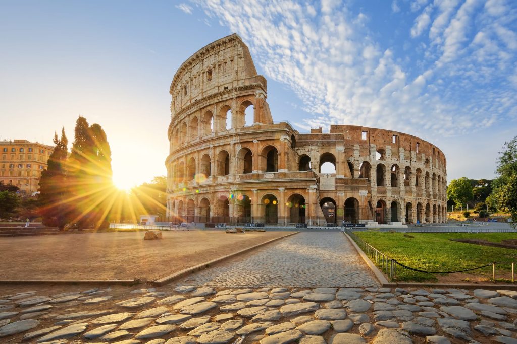 View of Colosseum in Rome and morning sun, Italy, Europe
