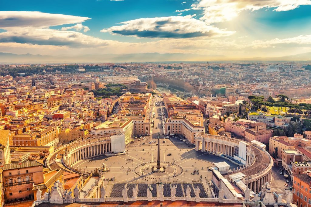 Saint Peter's Square in Vatican and aerial view of Rome