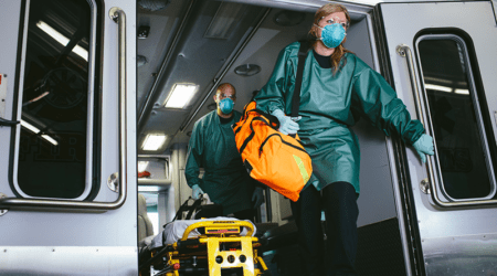 Action-Shot Isolation Gowns and Coveralls in action