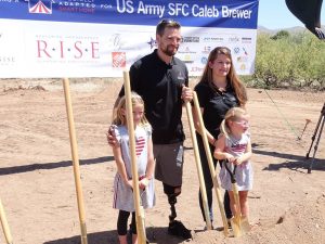 United States Army Sergeant First Class Caleb Brewer (Ret.) , with wife Ashley and daughters Evelyn and Emily at the groundbreaking.