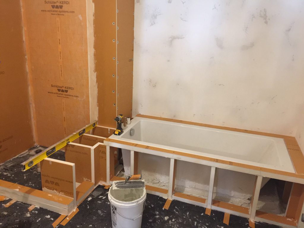1-1/2” Kerdi-Board legs supported a 2”-thick platform for the tub deck