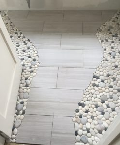 “Pebble scribing is very common because cutting pebbles in a straight line doesn’t look or feel like a natural transition,” McDaniel said.