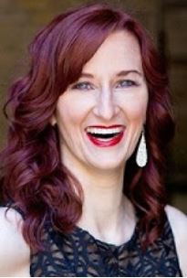 Smiling woman with red hair