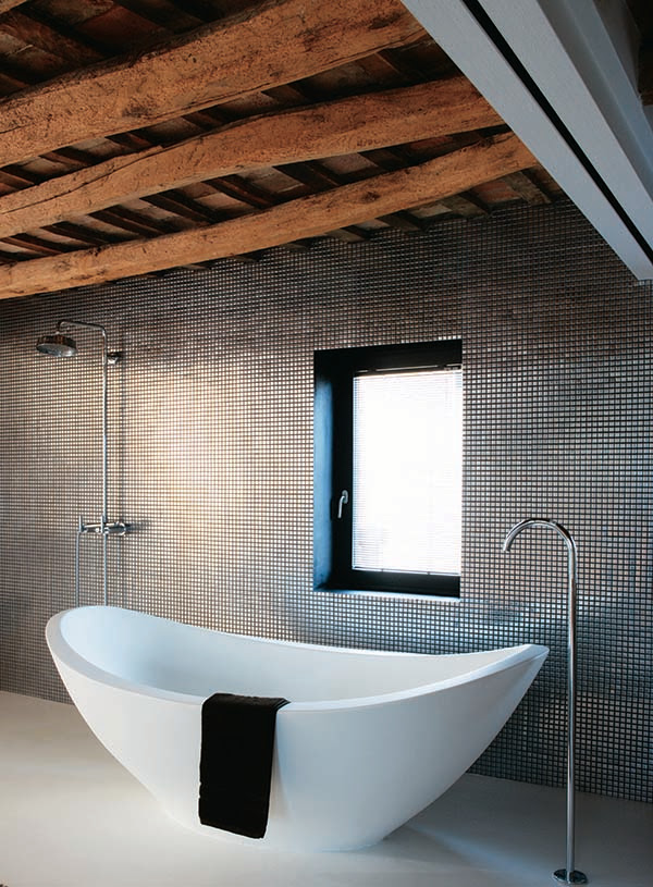 bathtub with square metal metallic wall