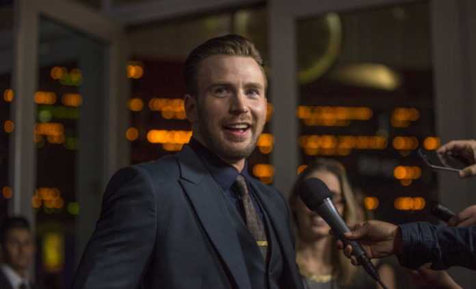 Director and cast member Evans is interviewed at the premiere of