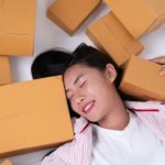 happy woman with parcel box