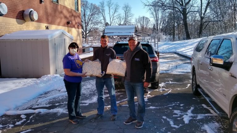 Cindy Reinhardt from the Durand Arkansaw School District accepts a donation from Steve Bechel of Eau Galle Cheese Factory and Don Weiss from Weiss Family Farms. (Courtesy: Brian Winnekins) Cindy Reinhardt from the Durand Arkansaw School District accepts a donation from Steve Bechel of Eau Galle Cheese Factory and Don Weiss from Weiss Family Farms. (Courtesy: Brian Winnekins)
