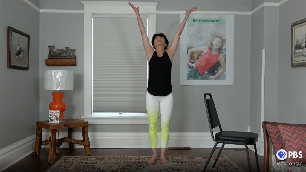 fitness instructor takes deep breath in