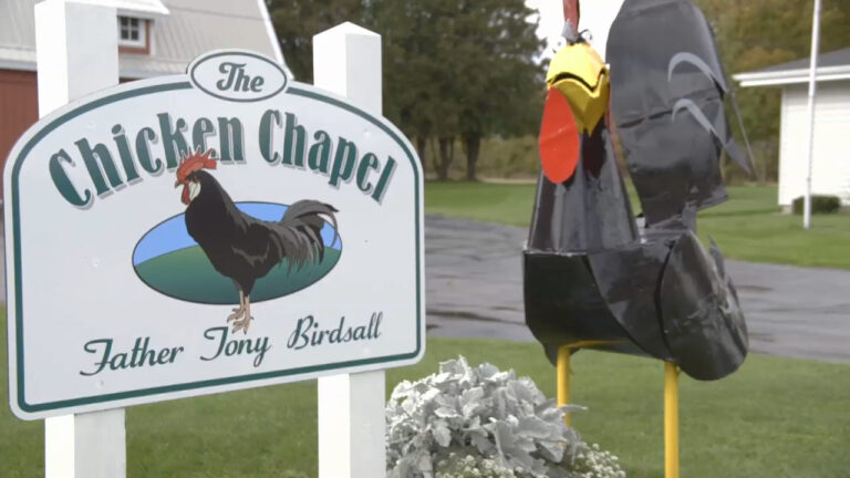 Sign that reads Chicken Chapel, Father Tony Birdsall Sign that reads Chicken Chapel, Father Tony Birdsall