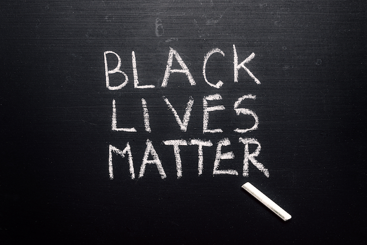 Anti-racism resources in the classroom. Photo of chalkboard with text "Black lives matter"